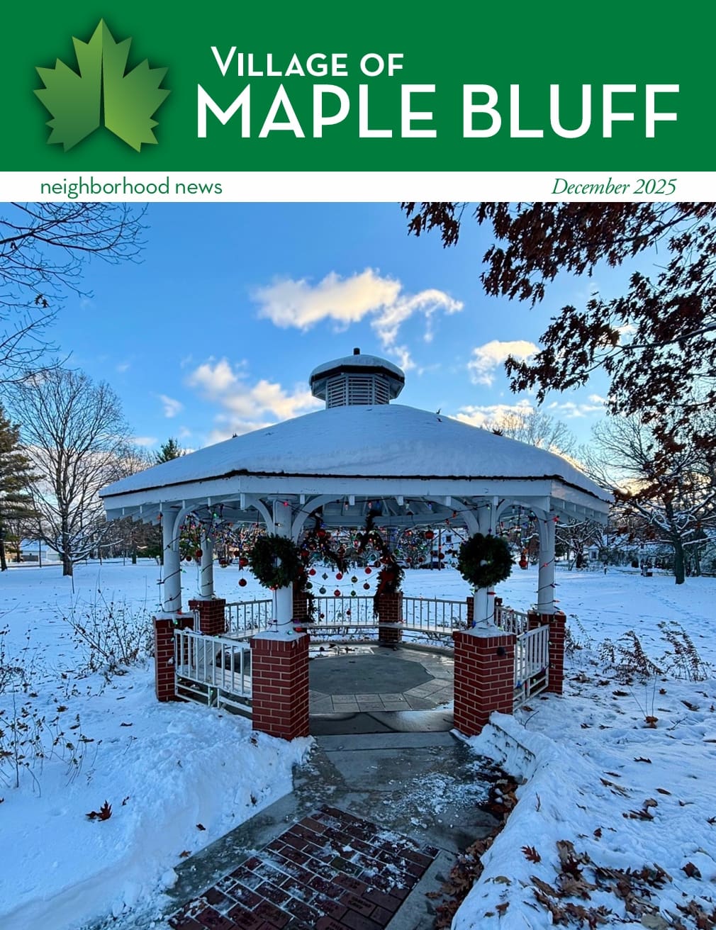 A snow-covered gazebo decorated with wreaths and ornaments stands in a park surrounded by snow. The scene is featured on the December 2025 cover of the Village of Maple Bluff neighborhood news.